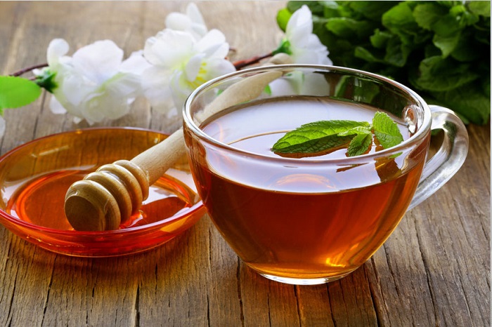 طرز تهیه نوشیدنی چای سبز گل رز با پرتقال و عسل